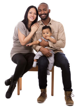 Image of a young couple and their baby