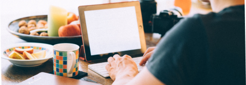 Photo of man using computer